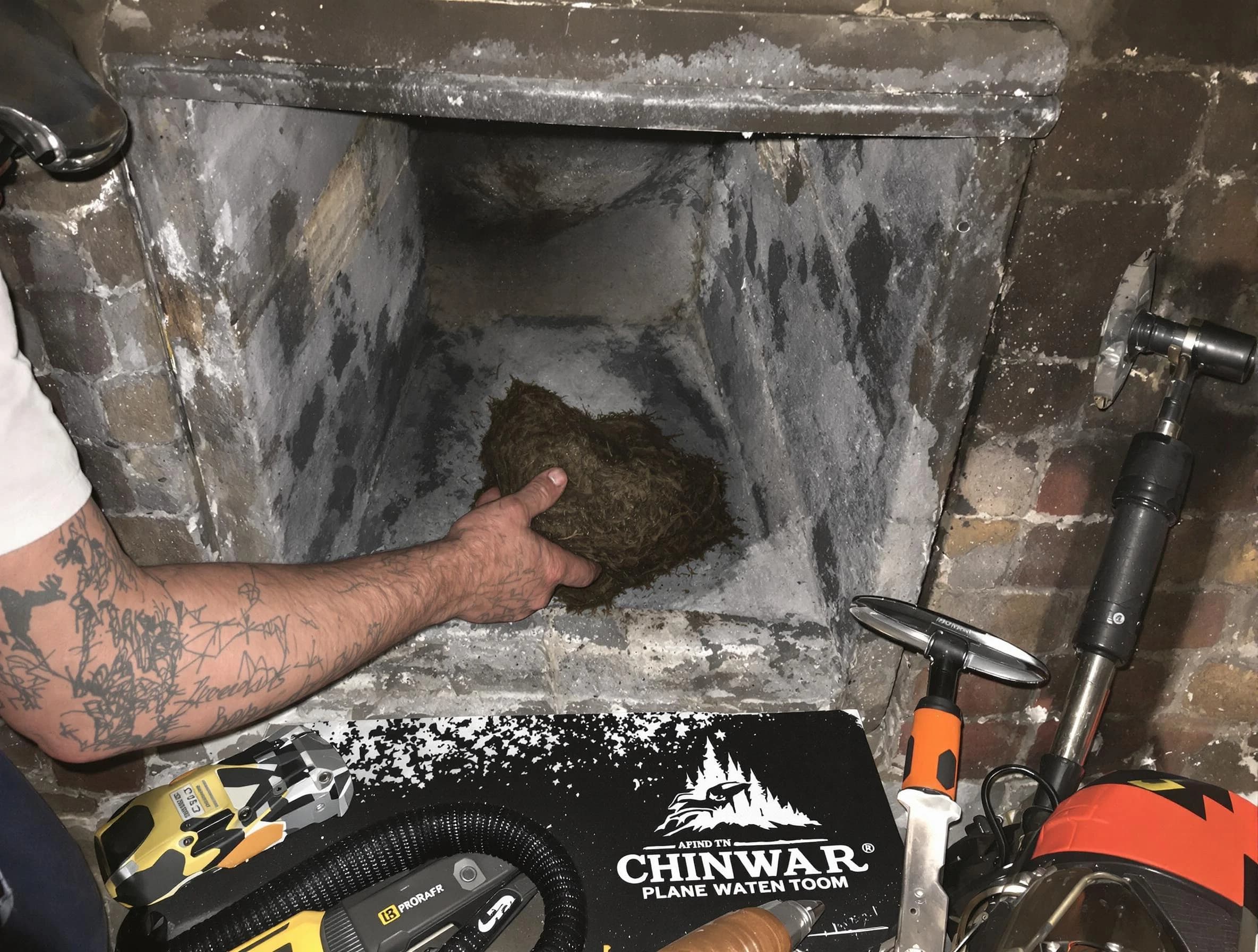 Scott Chimney Sweep safely removing debris and screening chimney in Scott, PA